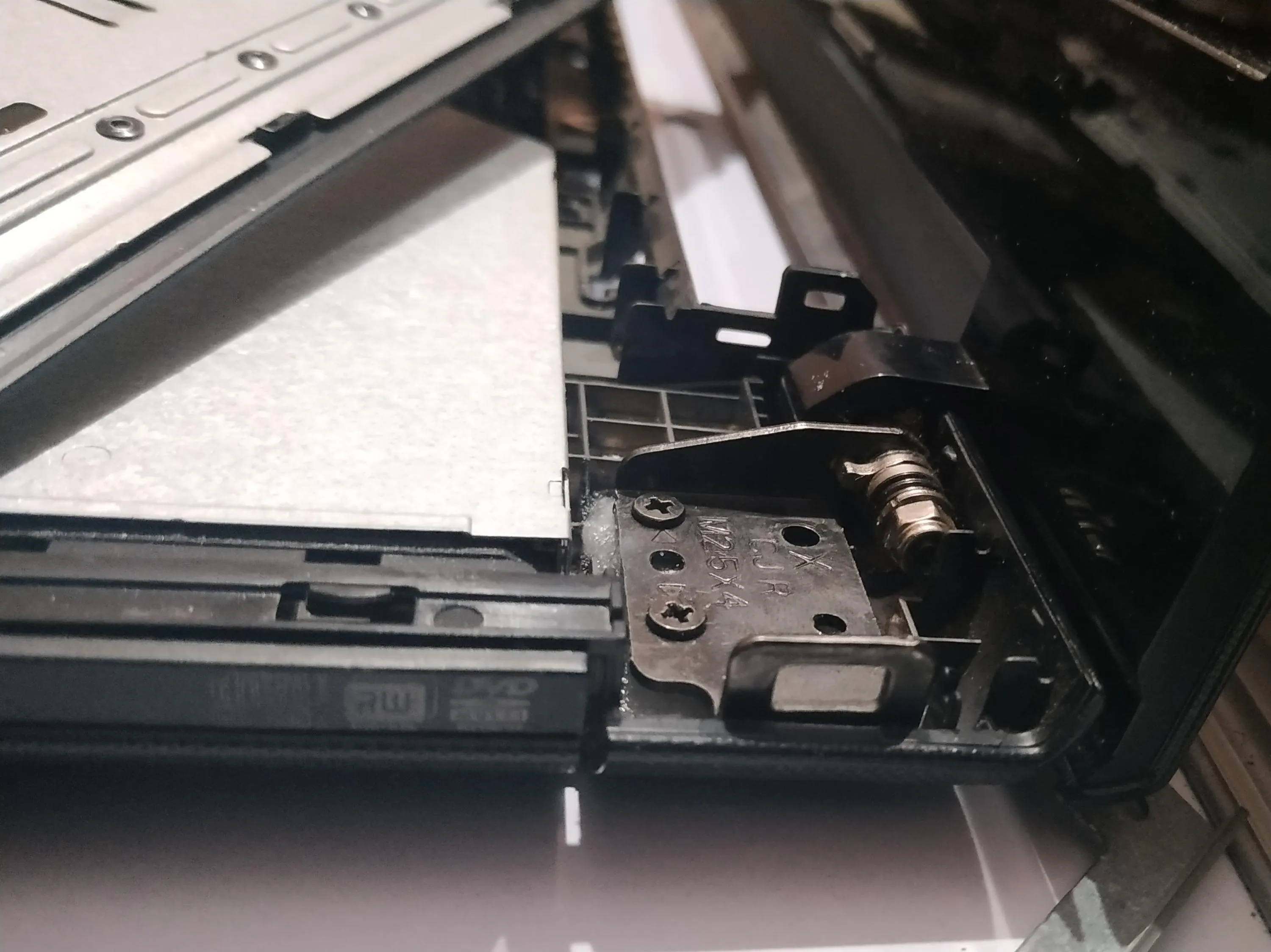 Screwed the hinge back in place