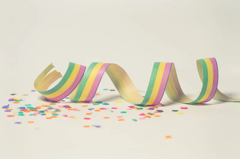 pink green and yellow ribbon illustration