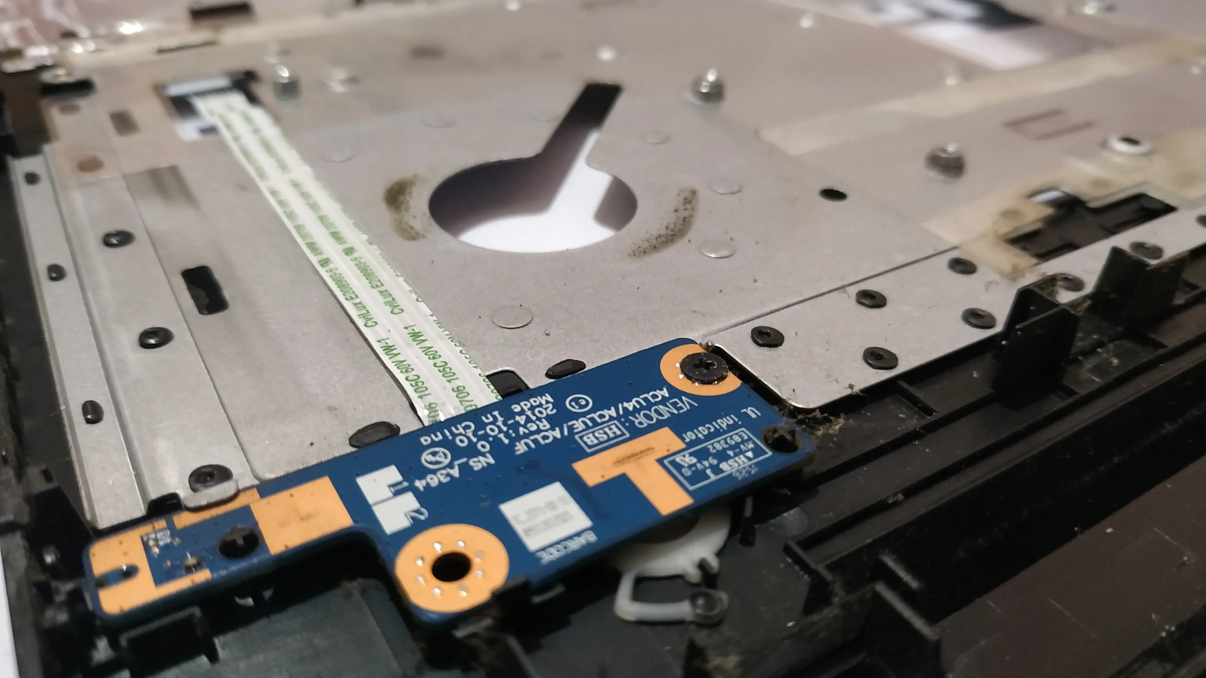 The PCB beneath the power button